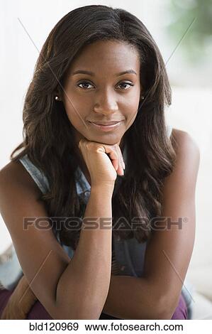 Stock Photo - Black woman smiling. Fotosearch