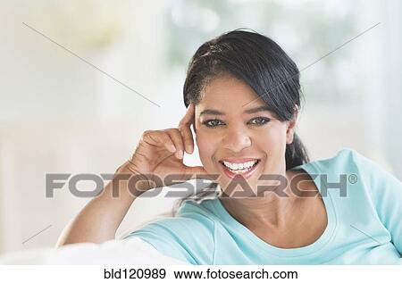 Stock Photo - Black woman smiling. Fotosearch