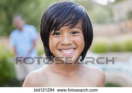 Boy smiling outdoors View Large Photo Image Picture - Boy smiling outdoors. Fotosearch
