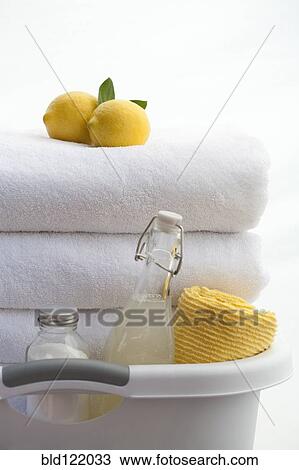 Bucket of soap, towels and lemons View Large Photo Image Stock Image - Bucket of soap, towels and lemons . Fotosearch