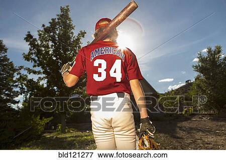 Caucasian boy playing baseball outdoors View Large Photo Image Stock Photo - Caucasian boy playing baseball outdoors. Fotosearch