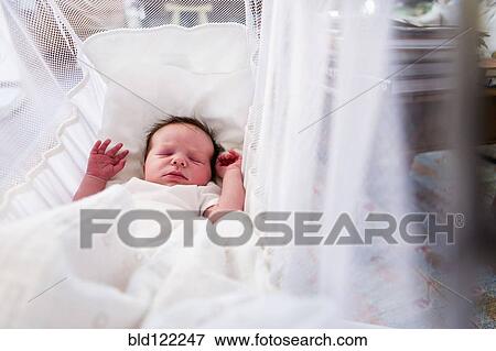 Caucasian Newborn Baby Boy Laying In Crib Picture Bld122247