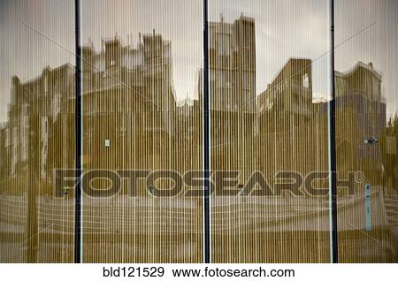 Stock Photo - City buildings reflected in windows, Malmo, Sweden. Fotosearch