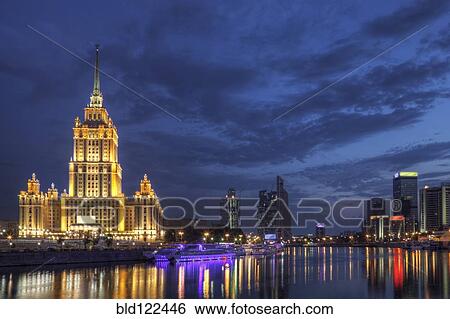 Stock Photograph - City skyline illuminated at night, Moscow, Russia. Fotosearch