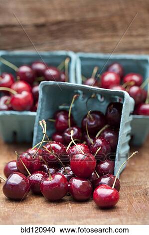 Stock Image - Close up of bing cherries in cartons. Fotosearch