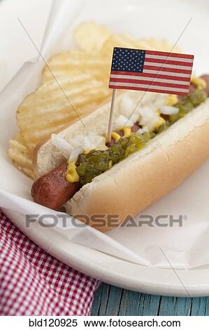 Close up of hot dog with American flag View Large Photo Image Stock Photography - Close up of hot dog with American flag. Fotosearch