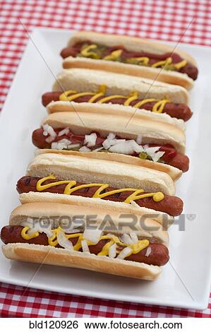 Close up of plate of hot dogs View Large Photo Image Stock Photograph - Close up of plate of hot dogs. Fotosearch