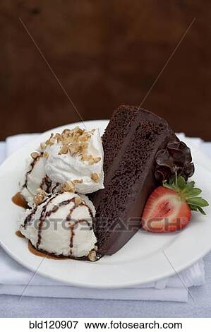 Close up of slice of chocolate cake View Large Photo Image Stock Photo - Close up of slice of chocolate cake. Fotosearch