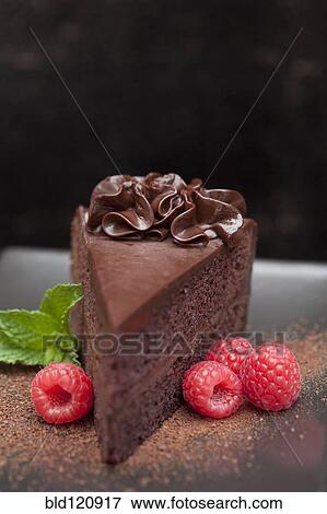 Stock Photo - Close up of slice of chocolate cake. Fotosearch