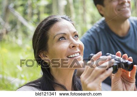 Couple bird watching View Large Photo Image Stock Image - Couple bird watching. Fotosearch