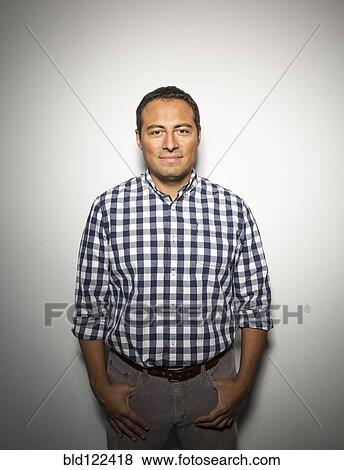 Stock Photo - Hispanic businessman smiling. Fotosearch