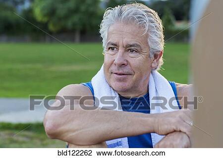 Hispanic man exercising in park View Large Photo Image Stock Image - Hispanic man exercising in park. Fotosearch