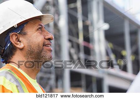 Stock Photo - Hispanic worker at construction site. Fotosearch