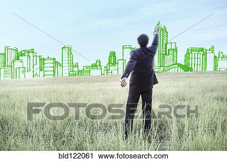 Indian businessman drawing buildings on sky View Large Photo Image Stock Image - Indian businessman drawing buildings on sky. Fotosearch