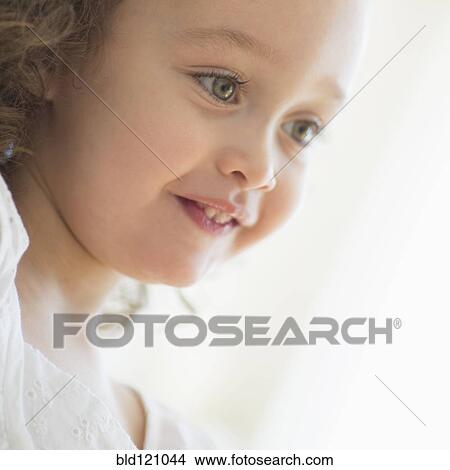Picture - Mixed race girl smiling. Fotosearch