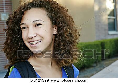 Mixed race girl smiling View Large Photo Image Stock Photo - Mixed race girl smiling. Fotosearch