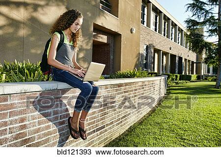 Mixed race student using laptop View Large Photo Image Stock Image - Mixed race student using laptop. Fotosearch