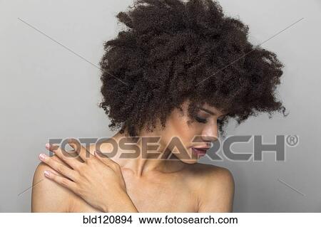 Picture - Mixed race woman smiling. Fotosearch