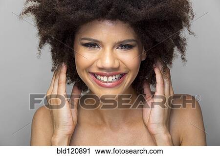 Mixed race woman smiling View Large Photo Image Stock Image - Mixed race woman smiling. Fotosearch