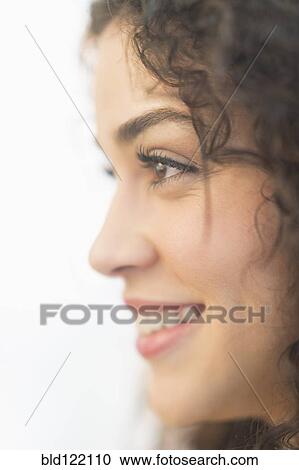 Stock Image - Mixed race woman smiling. Fotosearch
