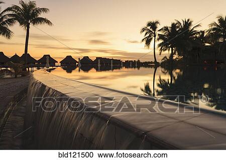 Palm trees overlooking tropical resort, Bora Bora, French Polynesia View Large Photo Image Stock Image - Palm trees overlooking tropical resort, Bora Bora, French Polynesia. Fotosearch
