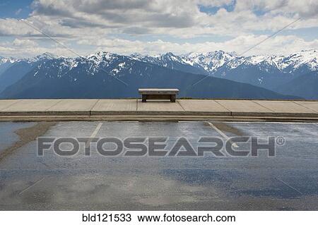 Stock Image - Park bench facing Hurricane Ridge, Olympic National Park, Port Angeles, Washington, United States. Fotosearch
