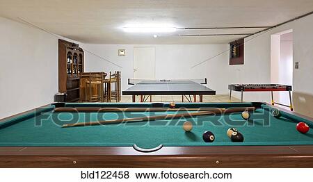 Pool table and ping pong table in basement View Large Photo Image Stock Photo - Pool table and ping pong table in basement. Fotosearch
