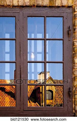 Rooftop reflected in windows, Malmo, Sweden View Large Photo Image Stock Image - Rooftop reflected in windows, Malmo, Sweden. Fotosearch
