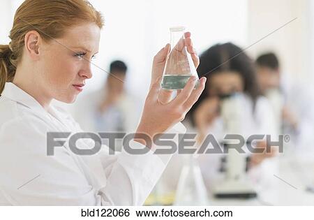 Scientist working in laboratory View Large Photo Image Stock Photograph - Scientist working in laboratory. Fotosearch