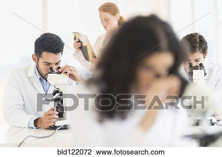 Scientists working in laboratory View Large Photo Image Stock Image - Scientists working in laboratory. Fotosearch