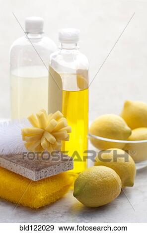 Stock Photo - Scrubber, sponges, cleaning soap and lemons. Fotosearch