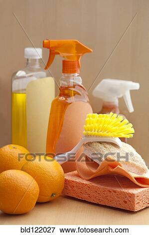 Spray bottles, sponge, scrubber and oranges View Large Photo Image Stock Photo - Spray bottles, sponge, scrubber and oranges. Fotosearch