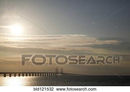 Sun in sky over Oresund Bridge, Malmo, Sweden View Large Photo Image Stock Image - Sun in sky over Oresund Bridge, Malmo, Sweden. Fotosearch