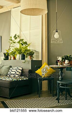 Table, chairs and sofa in modern living room View Large Photo Image Stock Photography - Table, chairs and sofa in modern living room. Fotosearch