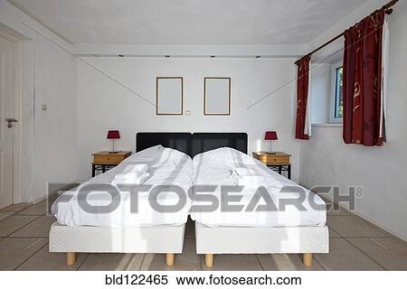 Twin beds pushed together in bedroom View Large Photo Image Stock Photography - Twin beds pushed together in bedroom. Fotosearch