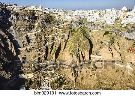 Aerial view of city built on rocky hilltop, Oia, Egeo, Greece View Large Photo Image Stock Image - Aerial view of city built on rocky hilltop, Oia, Egeo, Greece. Fotosearch