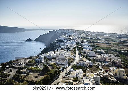 Aerial view of town along ocean, Oia, Egeo, Greece View Large Photo Image Stock Photo - Aerial view of town along ocean, Oia, Egeo, Greece. Fotosearch