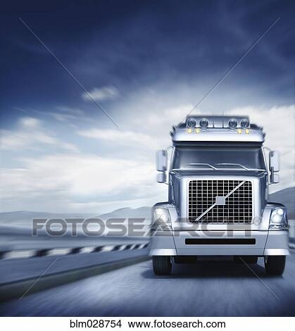 Blurred view of semi-truck driving on freeway View Large Photo Image Picture - Blurred view of semi-truck driving on freeway. Fotosearch