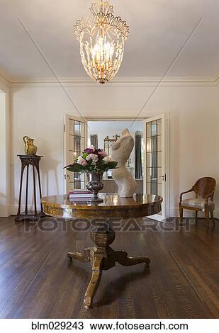 Bust and bouquet of flowers on table View Large Photo Image Stock Image - Bust and bouquet of flowers on table. Fotosearch
