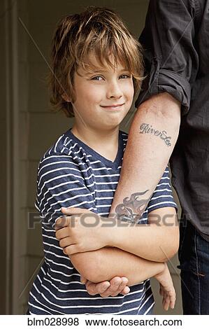 Caucasian boy holding father's hand View Large Photo Image Stock Photo - Caucasian boy holding father's hand. Fotosearch