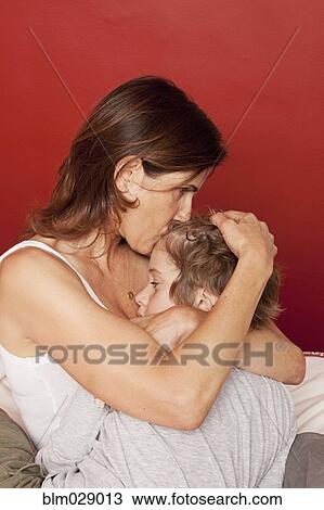 Caucasian mother hugging son View Large Photo Image Stock Image - Caucasian mother hugging son. Fotosearch
