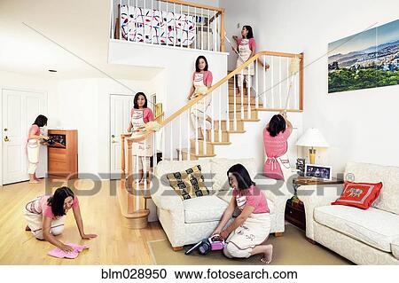 Stock Image - Chinese woman cleaning house. Fotosearch