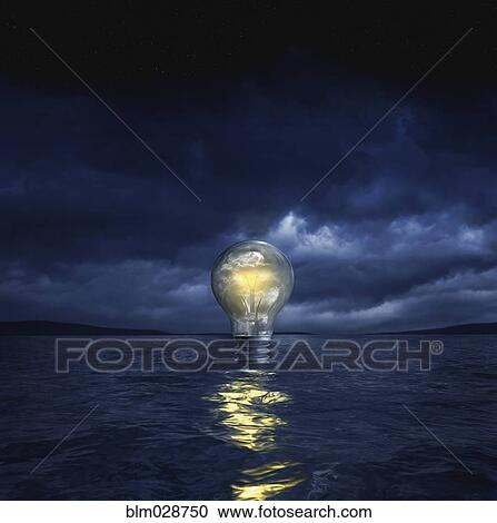 Illuminated light bulb floating in sea View Large Photo Image Stock Image - Illuminated light bulb floating in sea. Fotosearch