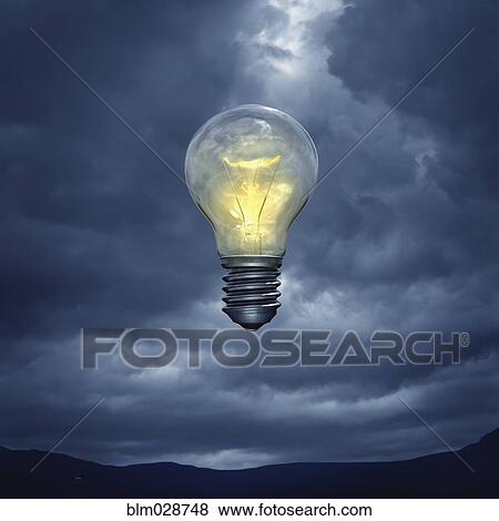 Illuminated light bulb floating in stormy sky View Large Photo Image Stock Photo - Illuminated light bulb floating in stormy sky. Fotosearch