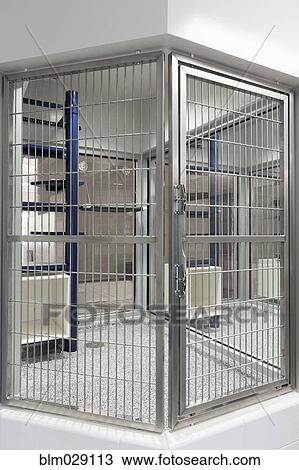 Metal doors of empty cage in animal shelter View Large Photo Image Stock Image - Metal doors of empty cage in animal shelter. Fotosearch
