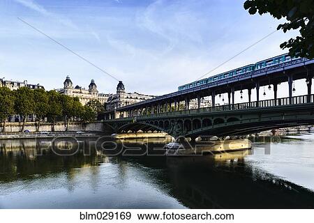 Paris city skyline reflected in river, Paris, France View Large Photo Image Stock Photo - Paris city skyline reflected in river, Paris, France. Fotosearch
