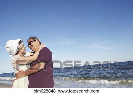 Senior couple dancing on tropical beach View Large Photo Image Stock Photo - Senior couple dancing on tropical beach. Fotosearch