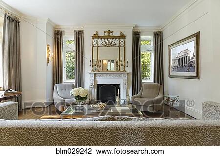Sofa and armchairs in ornate living room View Large Photo Image Stock Image - Sofa and armchairs in ornate living room. Fotosearch