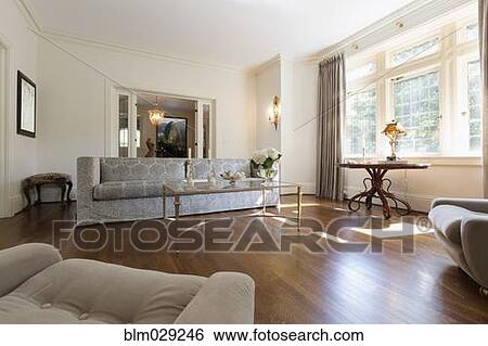 Sofa and armchairs in ornate living room View Large Photo Image Stock Photograph - Sofa and armchairs in ornate living room. Fotosearch