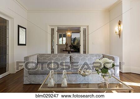 Sofa and coffee table in ornate living room View Large Photo Image Stock Photo - Sofa and coffee table in ornate living room. Fotosearch